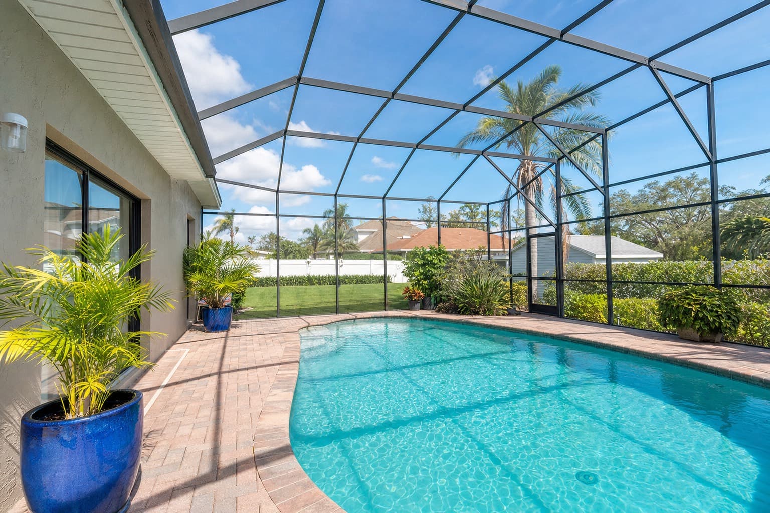 Sparkling clean screened in swimming pool in Florida